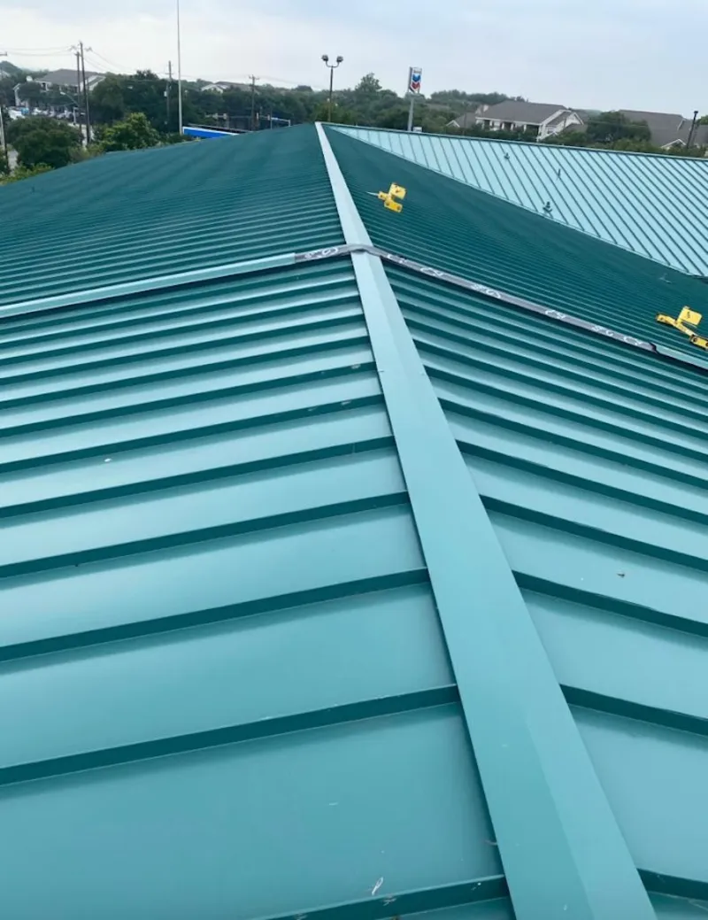Green commercial metal roof ridge and valley for Metal Roof Repair in Fountainhead-Orchard Hills